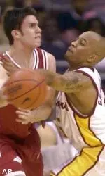 Brandon Granville applies pressure to Stanford's Chris Hernandez in the first half Thursday.