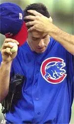 Mark Prior wipes his head after allowing an RBI single to Pittsburgh Pirates' Craig Wilson in the second inning.