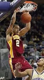 Nick Curtis scored 15 points to lead the Trojans, Saturday.