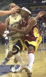 Rometra Craig drives past a Washington defender during the Trojans' 94-76 loss.