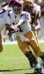 Quarterback Matt Leinart hands off against Arizona State during the first quarter.