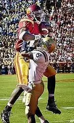 Wide reciever Mike Williams hauls in a touchdown pass over a UCLA defender in the first quarter.