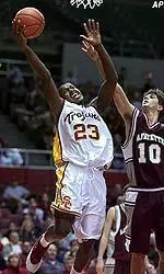 Rodrick Stewart puts up a shot as Lafayette's Justin DeBerry guards during the first half.