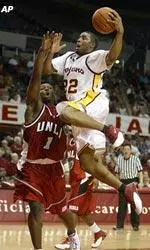 Southern California's Errick Craven, right, drives to the basket past UNLV's Demetrius Hunter during the second half at the Sports Arena in Los Angeles.
