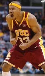 Desmon Farmer celebrates a big play during the Trojans' first-round win over Stanford.