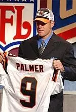 Carson Palmer shows off his new Cincinnati Bengals uniform after being selected first overall in the NFL draft.