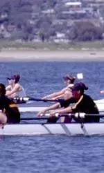 Mixed boat of novice and experienced rowers beats LMU JV Eight on Saturday.