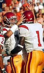 Quarterback Matt Leinart congratulates receiver Mike Williams after catching a 5-yard touchdown pass in the first quarter.