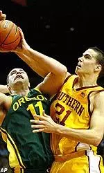 Center Rory O'Neil blocks a shot during the first half.