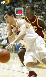 Lodrick Stewart defends against California's Richard Midgley in the second half