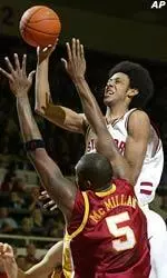 Stanford's Josh Childress attempts a shot as Southern California's Jeff McMillan defends in the first half.