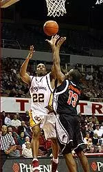 Errick Craven takes a shot over Oregon State's Chris Stephens during the second half.