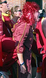 Rhi Jeffrey cheers on the Cardinal team.