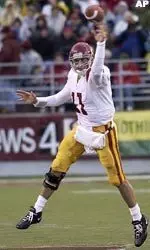 USC's Matt Leinart throws against Washington State in the first quarter. (AP Photo/Rajah Bose)