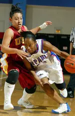 All-tournament pick Jamie Hagiya guided USC with 14 points and six steals (courtesy Steve Woltmann).