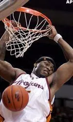 USC's Jeff McMillan drunks against UC Irvine during the second half. (AP Photo/Chris Carlson)