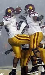 USC's Dominique Byrd celebrates with Fred Matua after hauling in a touchdown pass against Oregon State during the second quarter. (AP Photo/Rick Bowmer)