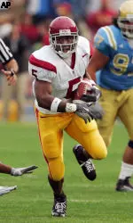 Reggie Bush makes a punt return for a touchdown. (AP Photo/Mark J. Terrill)