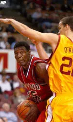 USC's Rory O'Neal guards Fresno State's Mustafa Al-Sayyad during the first half.