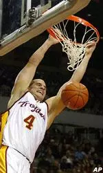 Southern California's Gregg Guenther Jr. dunks against California during the second half in Los Angeles.