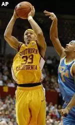 Desmon Farmer shoots against UCLA guard Dijon Thompson during the first half Wednesday.