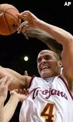 Gregg Guenther Jr. goes after a rebound during USC's game against Washington.