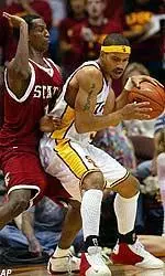 Desmon Farmer tries to back-down a WSU defender during the first half.