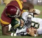 Manuel Wright sacks Colorado Satate's quarterback Justin Holland in the fouth quarter at the Coliseum. (AP Photo/Chris Carlson)