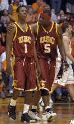 Jeff McMillan, right, consoles Nick Young, left, after a turnover. (AP Photo/Karl Maasdam)