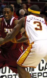 Washington's Kyle Weaver passes USC's Lodrick Stewart during the first half.