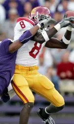 Dwayne Jarrett pulls in a 24-yard pass for a touchdown with Washington's Dashon Goldson defending during the first quarter at the Husky Stadium. (AP Photo/John Froschauer)