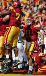 Matt Leinart, right, congratulates Winston Justice as he celebrates after he recovered a fumble in the end zone for a touchdown during the first half. (AP Photo/Mark J. Terrill)