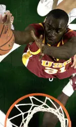USC's Abdoulaye Ndiaye goes for the rebound during the second half. (AP Photo/Al Grillo)