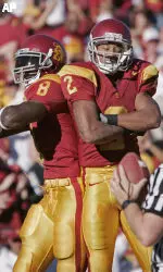 Dwayne Jarrett (8) and Steve Smith celebrate Jarrett's first-quarter touchdown on a Matt Leinart pass against UCLA. (AP Photo/Kevork Djansezian)