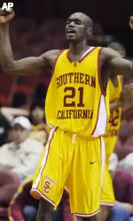 Abdoulaye N'diaye celebrates during the closing seconds of USC's 74-68 win over Brigham Young. The win marked Southern Cal's fourth straight victory. (AP Photo/Chris Pizzello)