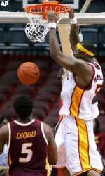 Jeff McMillan dunks the ball as Arizona State's Ike Diogu watches. (AP Photo/Danny Moloshok)