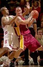 Gregg Guenther, right, is closely guarded by Stanford center Rob Little in the first half Thursday, Feb. 17, 2005, in Stanford, Calif. (AP Photo/Paul Sakuma)