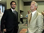 University of Southern California quarterback Matt Leinart, left, and head coach Pete Carroll wait to be introduced during PAC-10 media day Tuesday, Aug. 2, 2005, in Los Angeles. (AP Photo/Ric Francis)