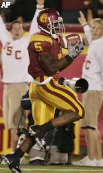 Reggie Bush makes a reception for a first quarter touchdown. (AP Photo/Mark J. Terrill)