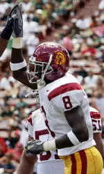 USC's Dwayne Jarrett (8) is congratulated by Dominique Byrd after scoring a touchdown against Hawaii at Aloha stadium in Honolulu. (AP Photo/Kevork Djansezian)
