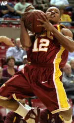 Ryan Francis goes up for a shot in the first half. (AP Photo/Mary Schwalm)