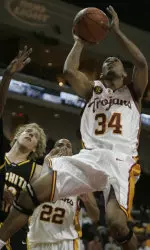 USC's Gabe Pruitt (34) drives to the basket against Wichita State's Kyle Wilson (32) during the second half. (AP Photo)