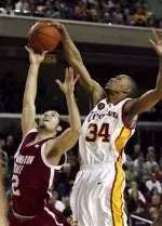 Southern California's Gabe Pruitt (34) gets the block on Washington State's Derrick Low's during the first half. (AP Photo)