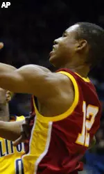 Ryan Francis goes up for a shot as California's Rod Benson guards during the first half. (AP Photo/George Nikitin)
