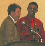 Nick Young receives the 2005-06 team MVP Award from head coach Tim Floyd
