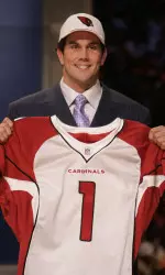 Matt Leinart, quarterback from USC, stands with a jersey after being selected by the Arizona Cardinals as the 10th overall selection during the first round of the NFL Draft at Radio City Music Hall in New York. (AP Photo/Ed Betz)