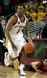 Nick Young, who led the Trojans with 18 points against Arizona State, brings the ball down court. (AP Photo/Jeff Lewis)
