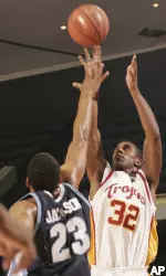 O.J. Mayo, who finished with 20 points, makes a three-point shot against San Diego's De'Jon Jackson during the first half.