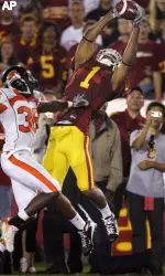 Patrick Turner makes a touchdown catch during the first half. (AP Photo/Mark J. Terrill)
