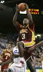 Lodrick Stewart drives to the basket to score against UCLA's Arron Afflalo in the first half. (AP Photo/Kevork Djansezian)